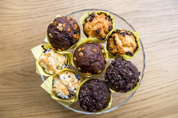 Chocolate muffins on wood