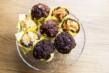 Chocolate muffins on wood