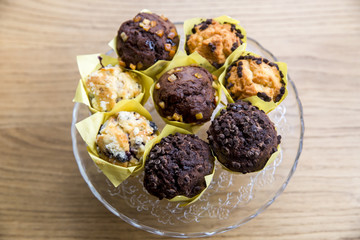 Chocolate muffins on wood