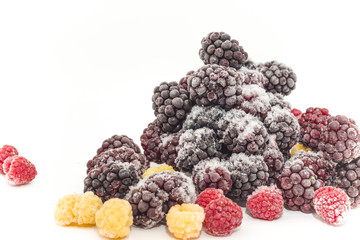 Dark frozen berries on a white background