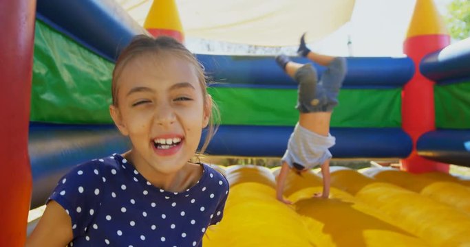 Kids playing on the bouncing castle 