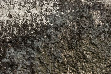 The surface of the wall is dirty.