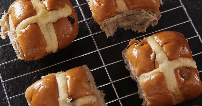 Hot cross bun on baking tray 