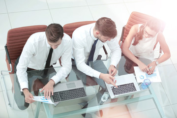 Obraz premium Image of a business people working in a modern office. Top view.