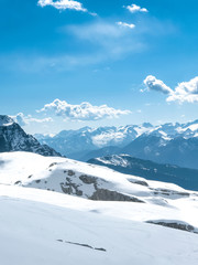 Fototapeta na wymiar Vertical landscape of high alpine peaks