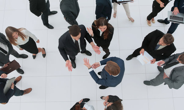 Elevated view of large group of multiethnic business people talk