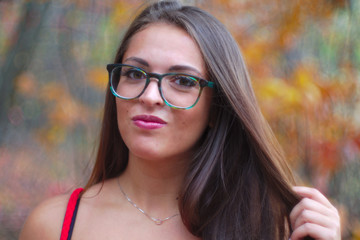 portrait of a young woman wearing glasses