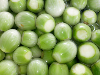Eggplant soaked in water, prepared to cook.