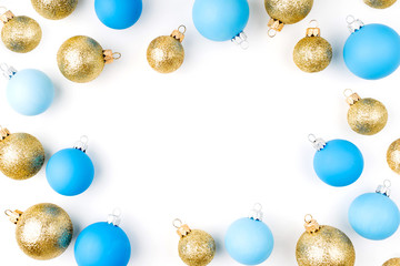 Naklejka na ściany i meble Stylish arrangement, frame of blue and gold christmas balls on white background. Flat lay, top view