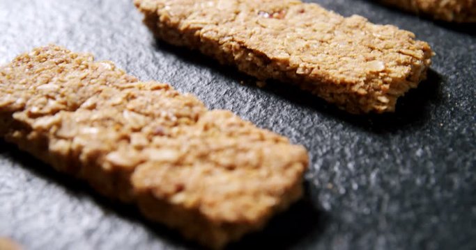 Granola bars on concrete background 