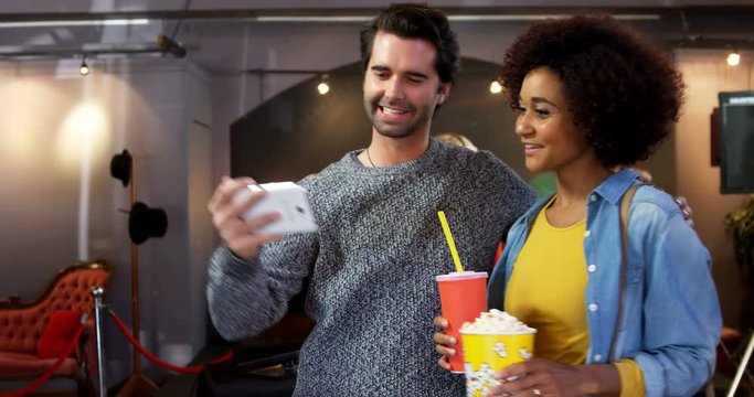 Couple taking selfie with mobile phone 