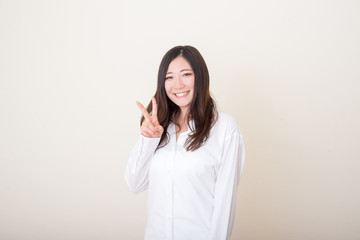 young asian woman with peace sign