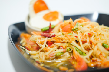 Som Tum papaya salad with salted egg.