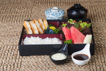japanese cuisine. lunch box set on the background