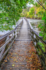 Fototapeta premium Wooden Walkway in Autumn