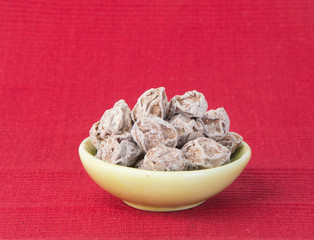 Salted Plum Tamarind Food Snack on a Background