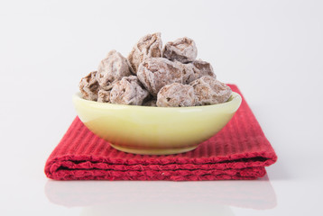 Salted Plum Tamarind Food Snack on a Background
