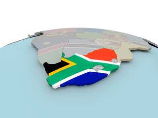 Political map of South Africa on globe with flag