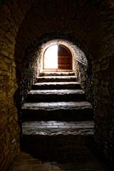 Medieval basement with stairs.