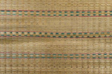 Close up texture of native thai style weave sedge mat background , made from papyrus