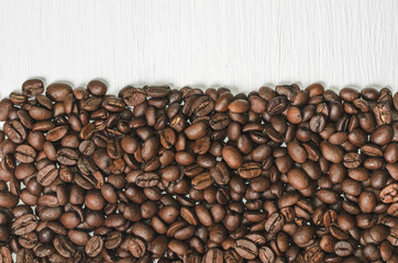 Frame of coffee beans with free space for text, white background top view