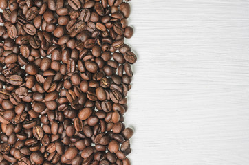 Frame of coffee beans with free space for text, white background top view