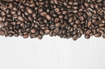Frame of coffee beans with free space for text, white background top view