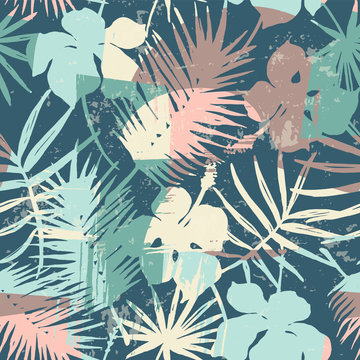 Seamless exotic pattern with tropical plants and artistic background.