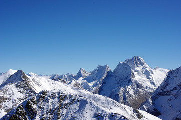 Naklejka premium Mountains landscape and fresh snow in the mountains in autumn