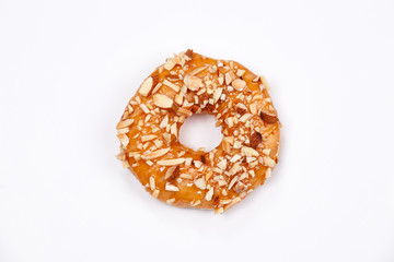 Delicious donut with almond caramel glazed, Isolated on white background.