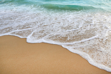 Background of sea wave and sand beach.
