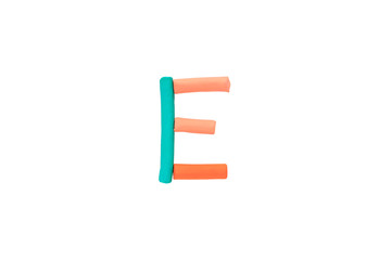 Colorful Alphabet " E " made from Plasticine (Clay) isolated on white background.