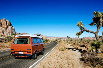 Desert road trip in an Old camper © Warwick-Woolie