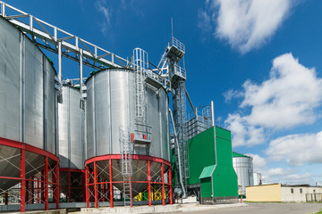 Obraz premium Modern large granary. Large metal silos.