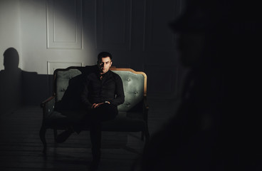 woman  with  theatrical mask and handsome man