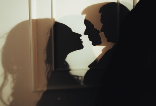 woman  with  theatrical mask and handsome man