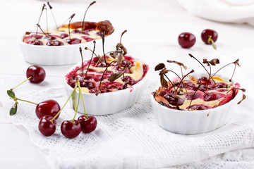 Cherry clafoutis - traditional French sweet fruit dessert.
