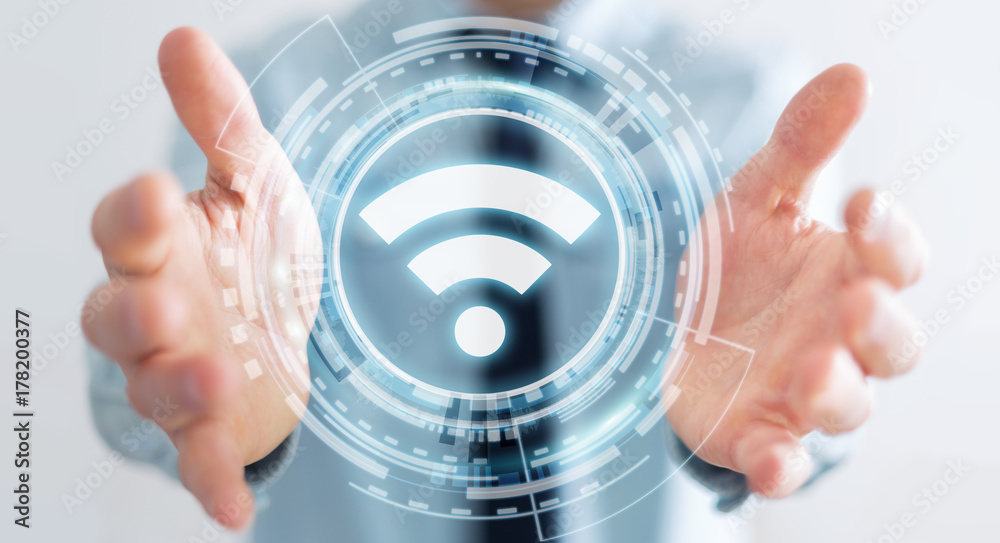 Wall mural businessman using free wifi hotspot interface 3d rendering