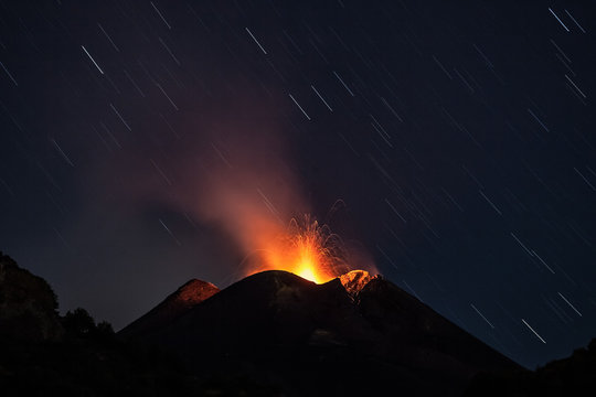 Nighttime at the Etna volcano, a weak strombolian activity , Zafferana, Sicily, Italy