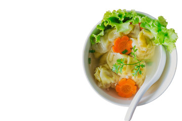 White isolated background homemade delicious minced pork and shrimp wonton dumpling soup in white bowl  top view flat lay. Wonton or dumpling is Chinese food for breakfast lunch or dinner.