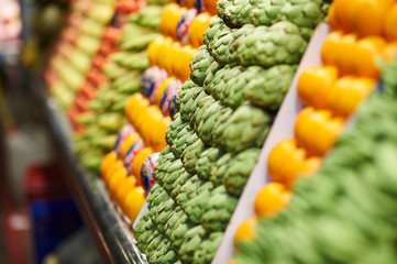 Vegetables in rows on market