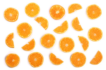 Slices of orange or tangerine isolated on white background. Flat lay, top view. Fruit composition
