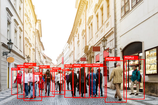 Machine Learning analytics identify person , smart city technology , Artificial intelligence concept. Software ui analytics and recognition people in city with flare light effect. Blur all human face.