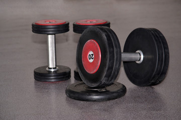 Obraz na płótnie Canvas Sports dumbbell with the weights.