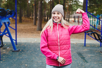 Portrait of a girl athletes on the outdoor Playground in the woods. A healthy lifestyle