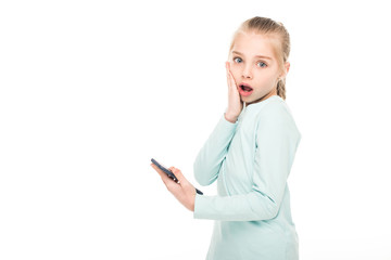 Fototapeta premium shocked child with smartphone