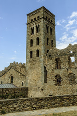 Fototapeta na wymiar belfry of the ruins of the Benedictine abbey of the Romanesque art close to the End of Creus in Gerona, Spain.