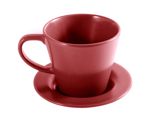 Empty red coffee cup and saucer on a white background