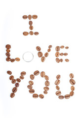 The inscription I love you made up of coffee beans