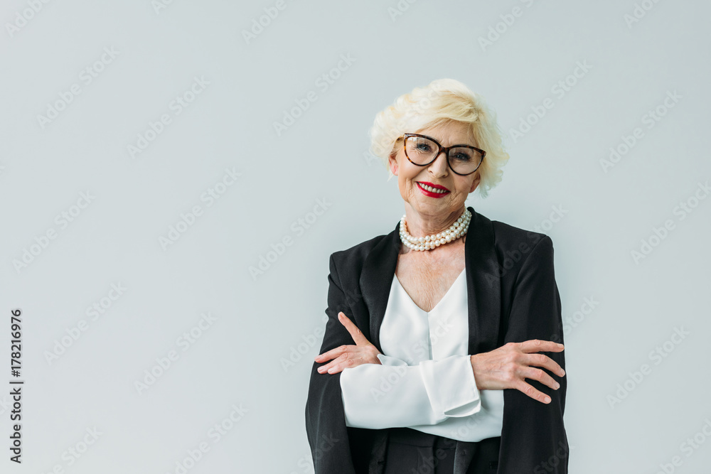 Wall mural senior lady with crossed arms